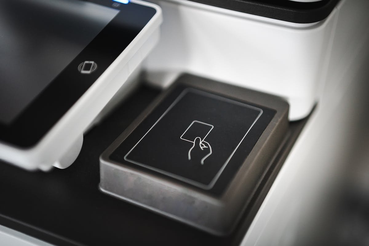 Close up of a contactless NFC payment reader for tap to pay transactions