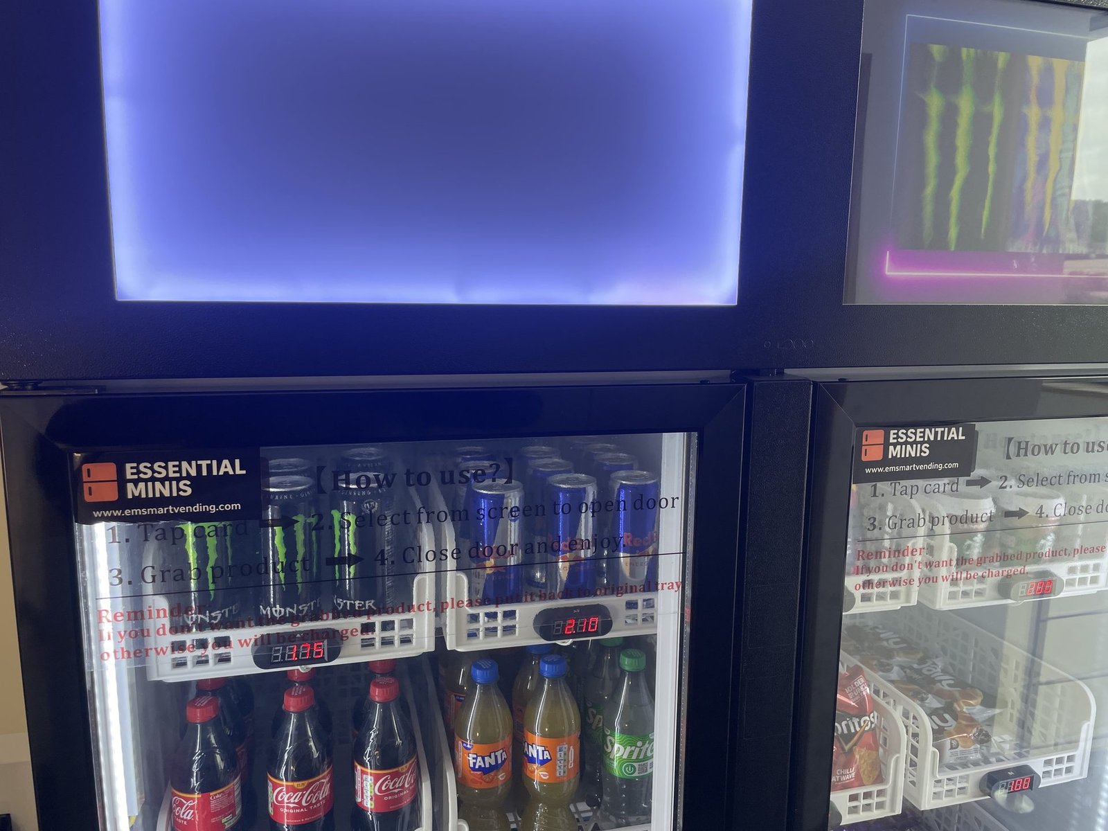 Multiple Essential Minis smart vending machines installed side by side with drinks and snacks