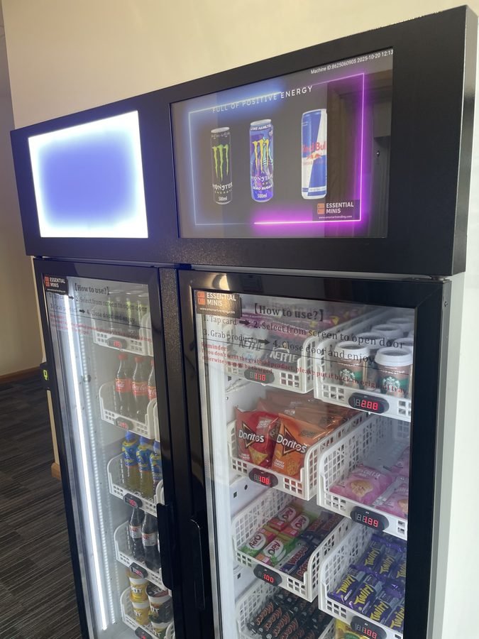 EM Smart Vending machine with digital touchscreen display showing product promotions