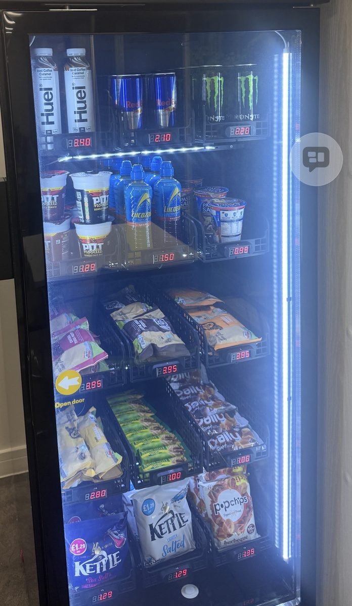EM Smart Vending machine stocked with Huel Monster Energy Pot Noodles Kettle Chips and premium snacks
